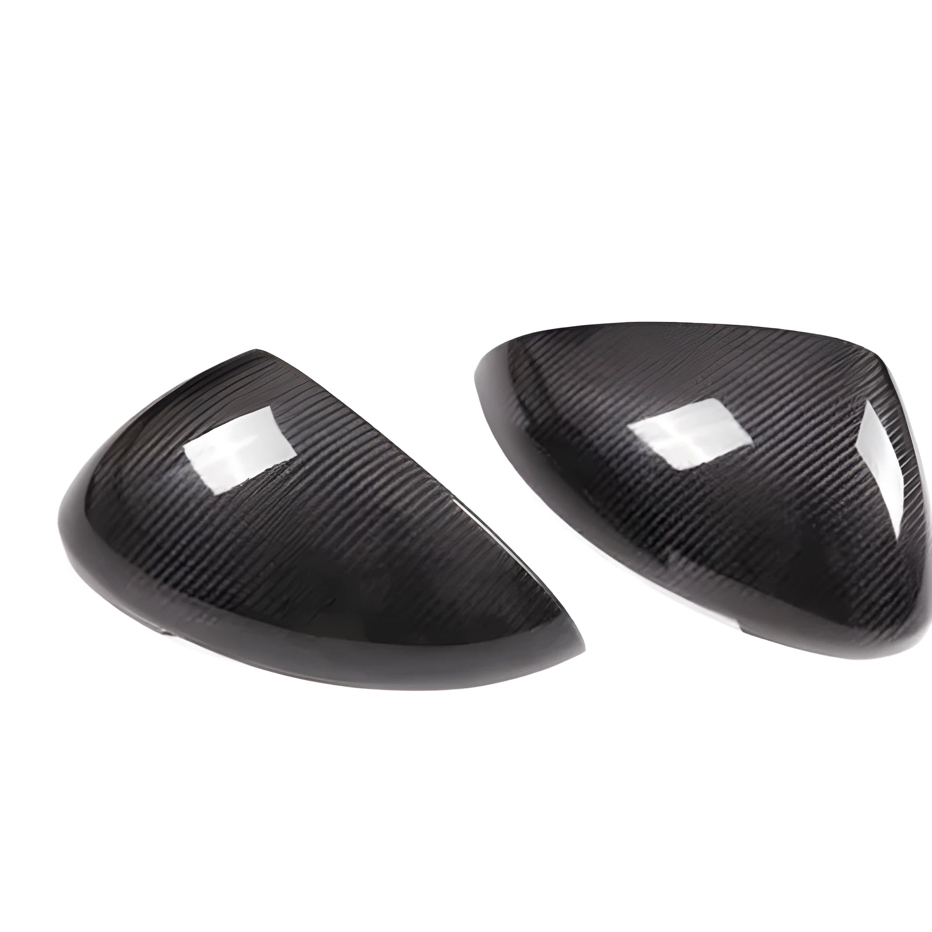 True carbon fibre rearview mirror cover for Porsche Macan, showing black woven pattern.