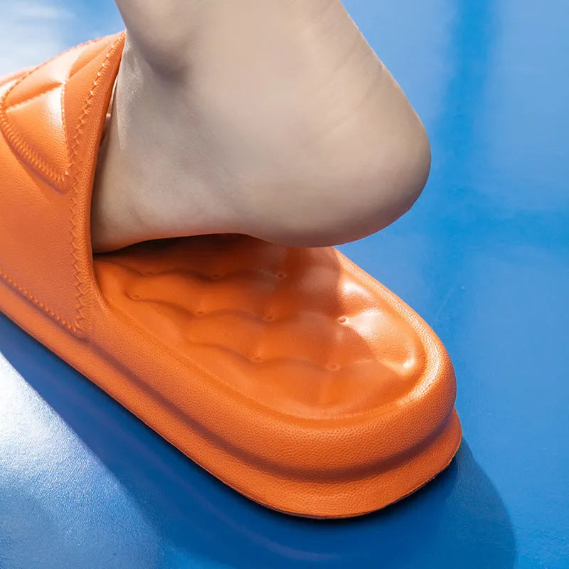 Pair of thick-soled EVA bathroom sandals in a chosen colour, showing moulded non-slip sole design.