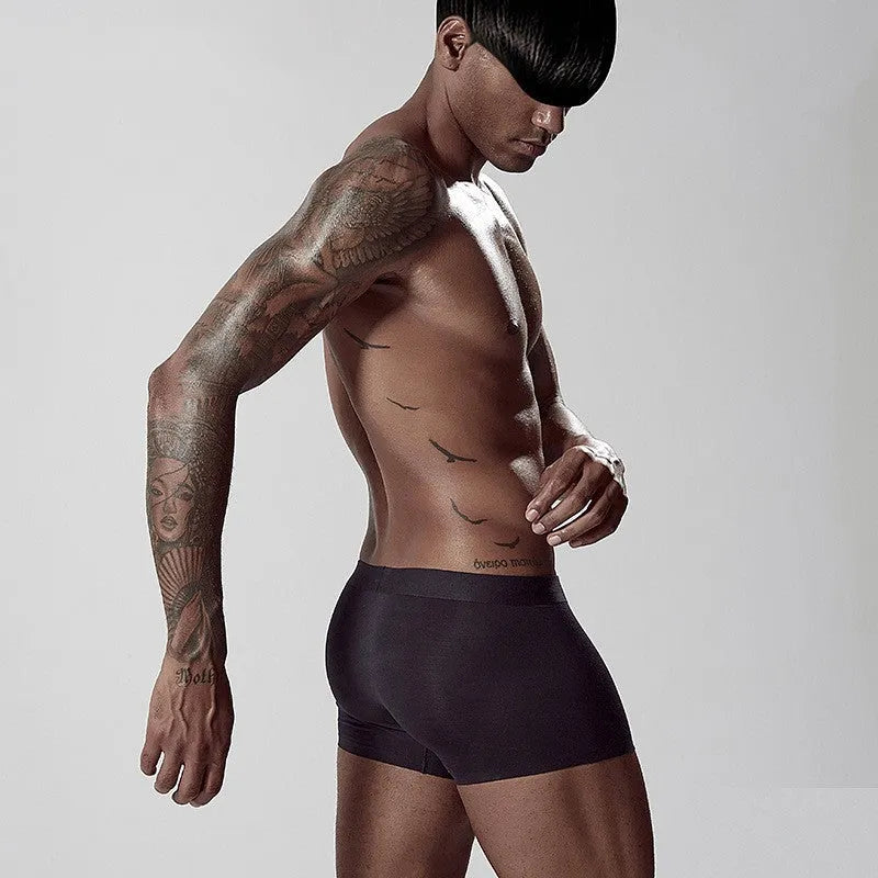 Men's seamless modal underwear in mid waist style showing hip lifting and body shaping design