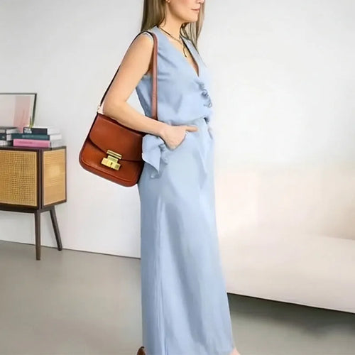 Women's casual two-piece suit with sleeveless top and long skirt in polyester fabric