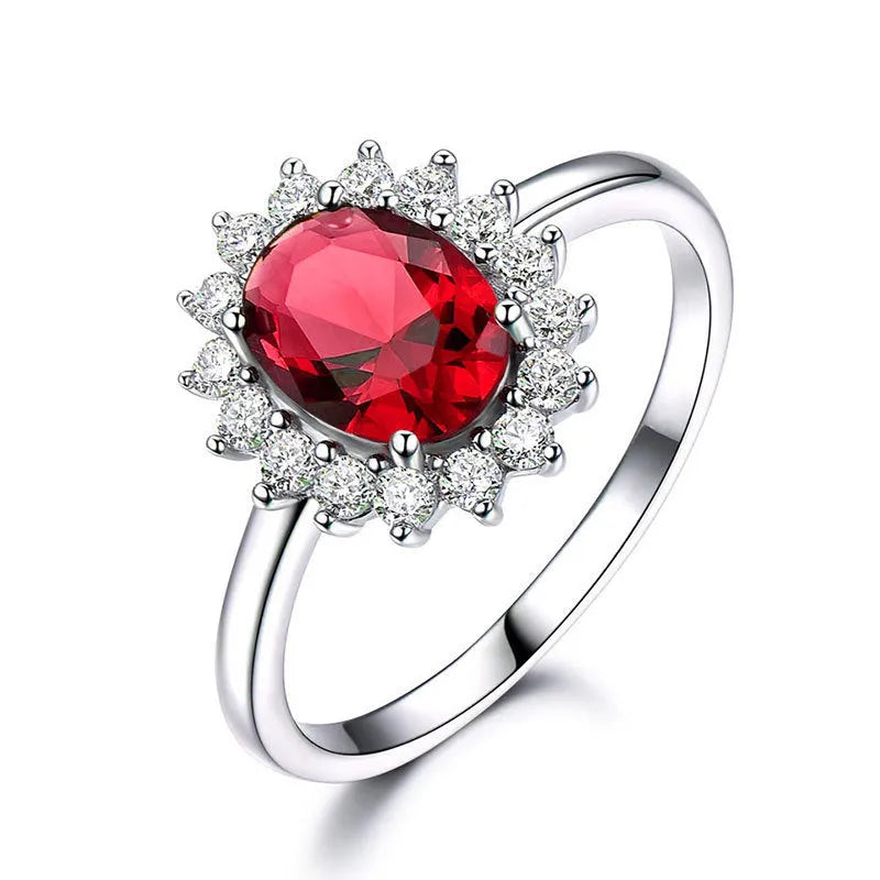Women's copper flower ring with moissanite centre, shown in green, sapphire blue, and pomegranate red colour options.