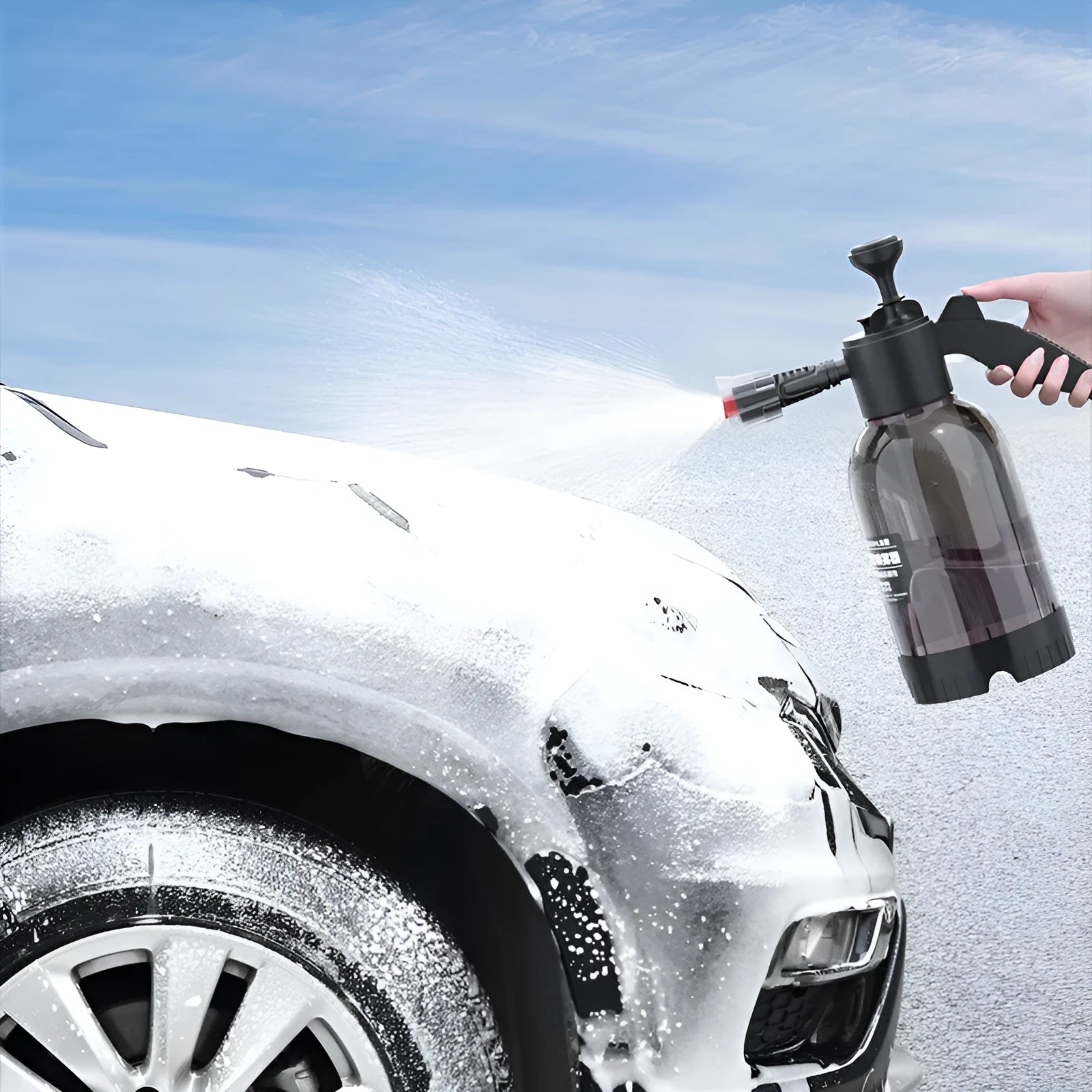Black hand-held spray sprayer with 2 litre capacity, ergonomic handle, and two nozzles for watering and cleaning.