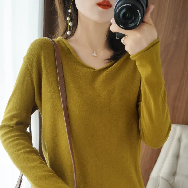 Women's long sleeve V-neck knitwear pullover top in a choice of ten colours on a hanger.