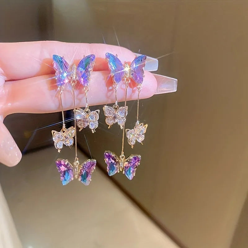 Silver needle blue purple butterfly tassel earrings with crystal flowers for women.