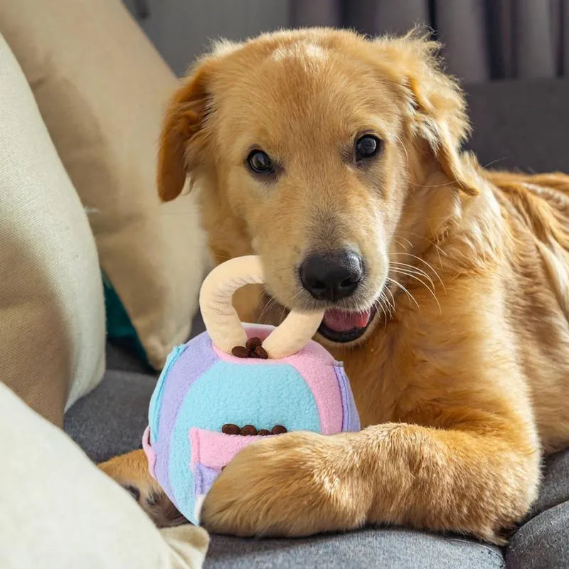 Green plush ball dog toy with multiple treat pockets and squeaker for small to medium dogs