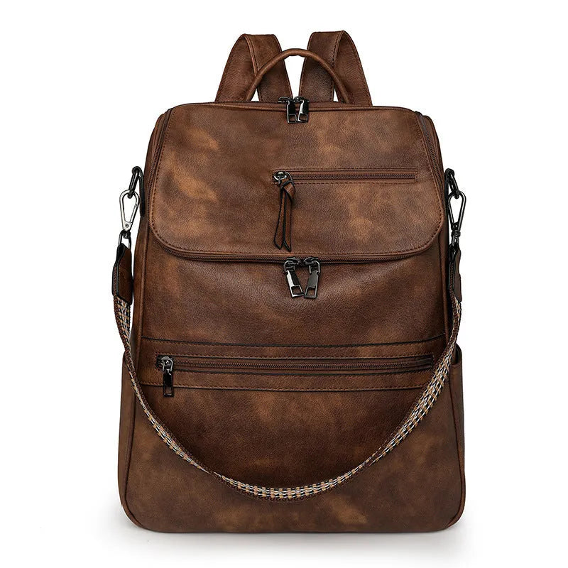 Retro style PU leather college backpack with curved shoulder straps, shown in one of six colour options.