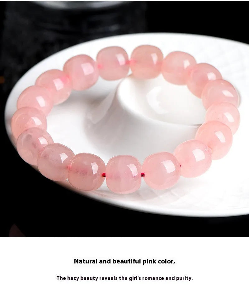 Pink crystal barrel bead bracelet with geometry design and polished finish