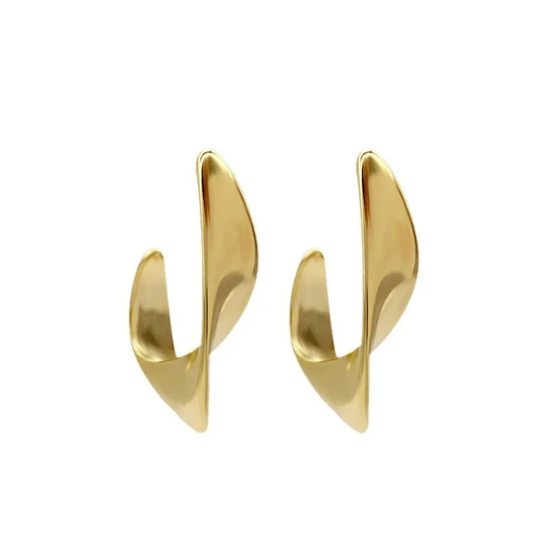 Metal twisted geometry earrings with round element in gold or silver electroplated finish