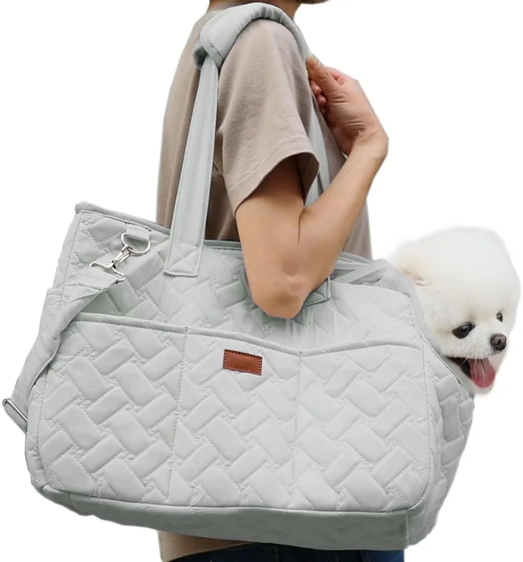 Grey mesh pet carrier bag with safety tether and multiple pockets for cat or small dog transport