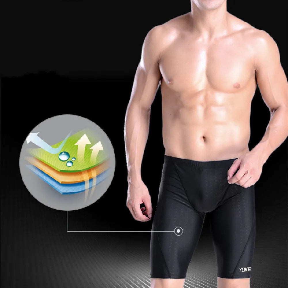 Men's black 5-piece swimming set including trunks, goggles, cap, ear plugs with nose clip, and carrying bag.