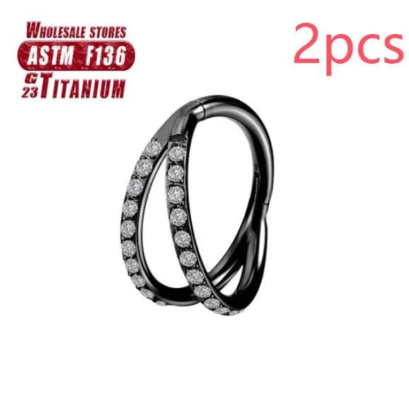 Titanium alloy fork nose ring in silver colour on a plain background, showing its shape and size.