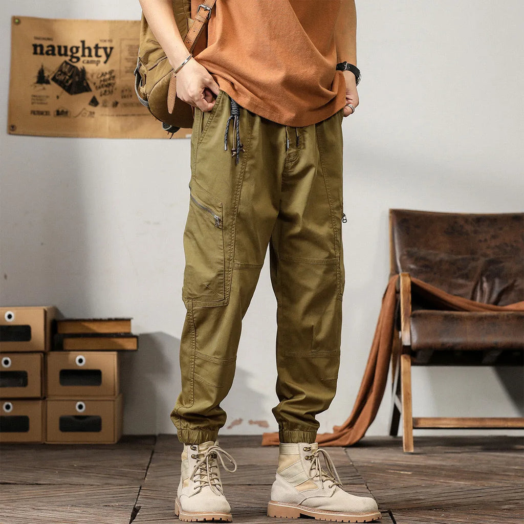 Men's loose cotton harem style trousers with tapered ankle banding in khaki colour
