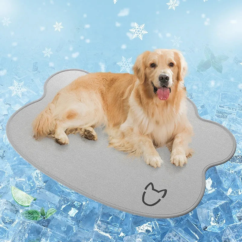 Ice silk dog cooling mat with dog head profile pattern in dark gray, non-slip base, shown on a wooden floor.