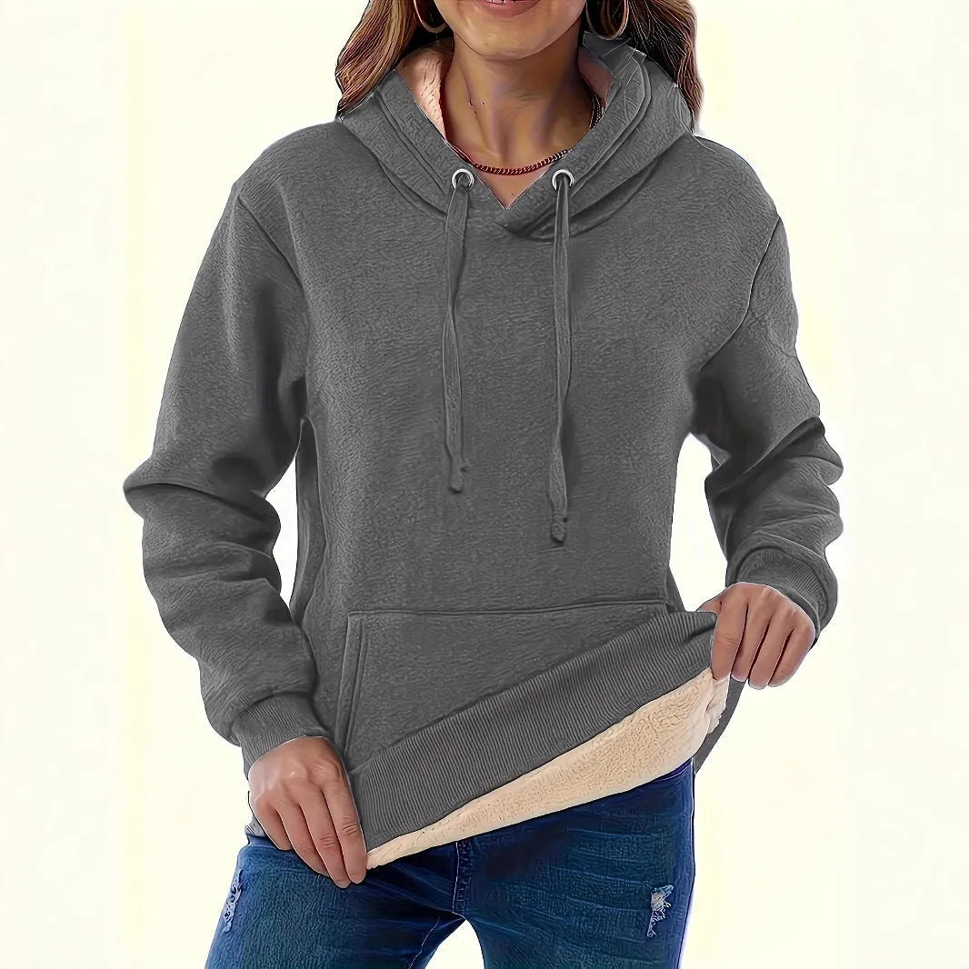 Women's loose fit hooded sweatshirt in thick polyester fabric with side pockets