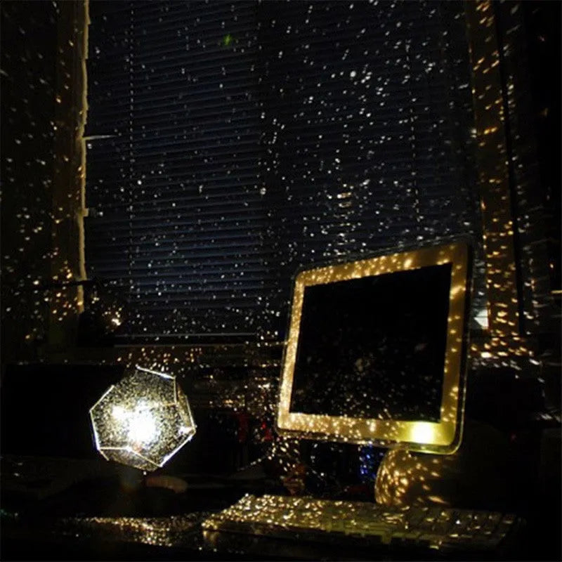 LED star projector night light showing constellation projection on a bedroom ceiling
