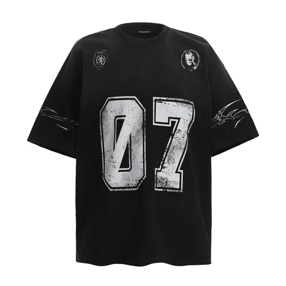 Man wearing a black printed cotton short-sleeved t-shirt, showing front design.
