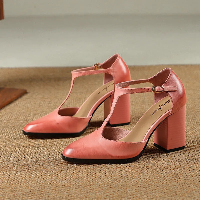 Retro pointed-toe women's Mary Jane shoes with a hollow design and buckle strap in pink or dark brown.