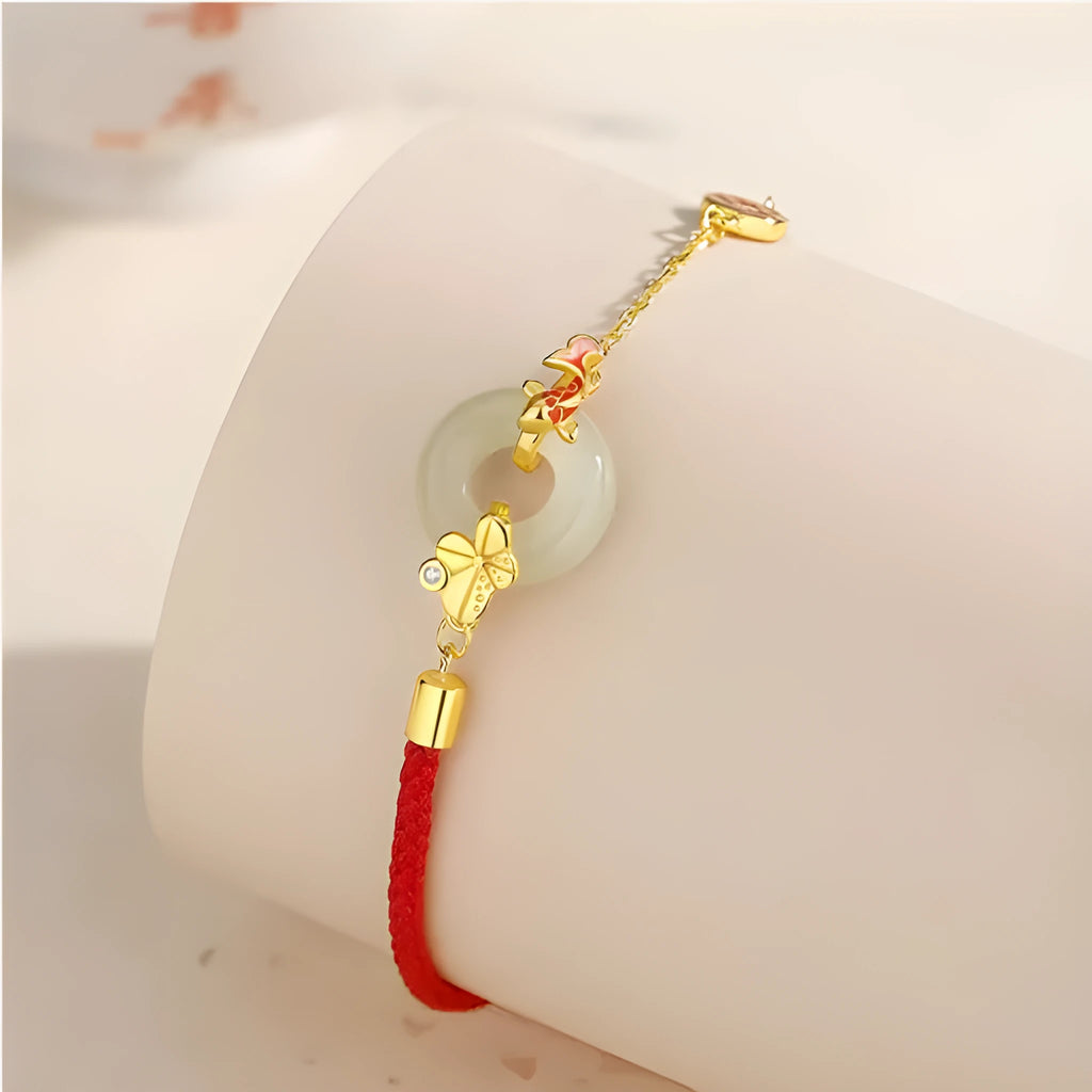 Koi peace buckle hetian jade red rope bracelet in 925 silver with gold electroplated finish