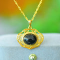 Flat copper inlaid pendant with natural ink blue Hetian jade stone on a necklace.
