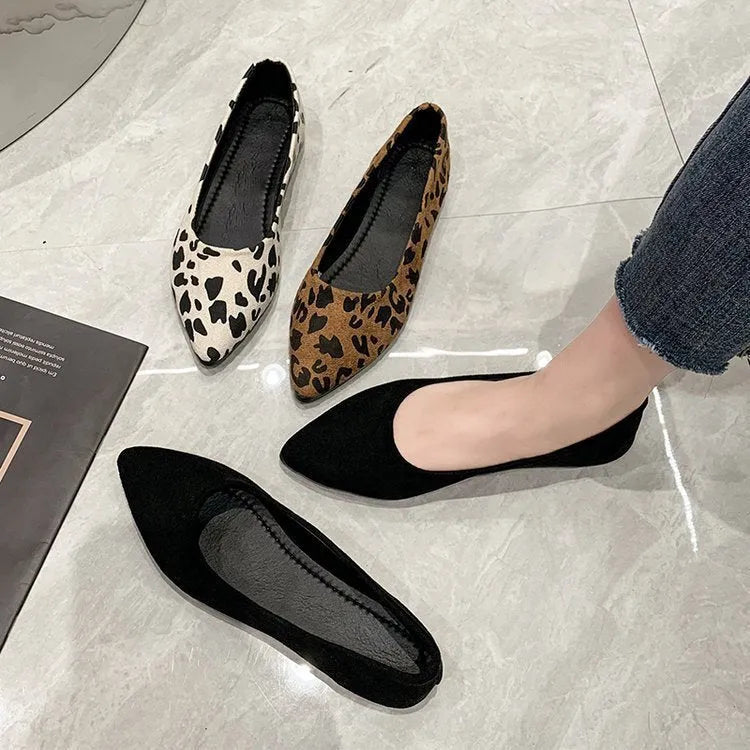 Women's leopard print flat pumps with pointed toe and low heel on rubber sole