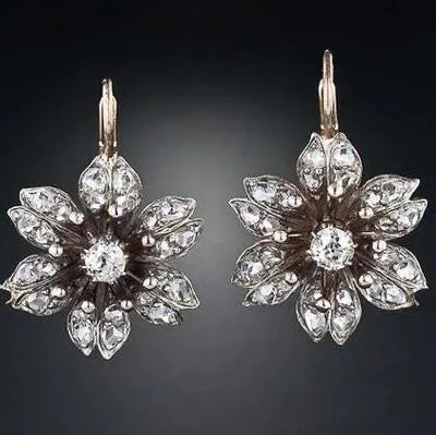 Women's retro fashion earrings in electroplated silver colour made from alloy metal