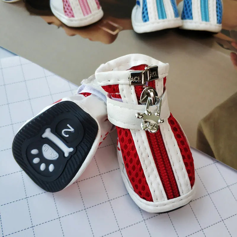 Set of four pairs of blue cloth dog sneakers with a side zipper for small breeds.