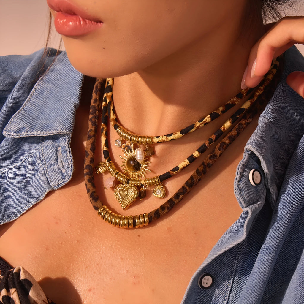 Stainless steel geometric necklace with gold electroplated finish and adjustable chain
