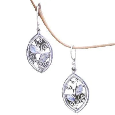 Women's silver colour leaves-shaped earrings with embedded moonstone stones and botanical design