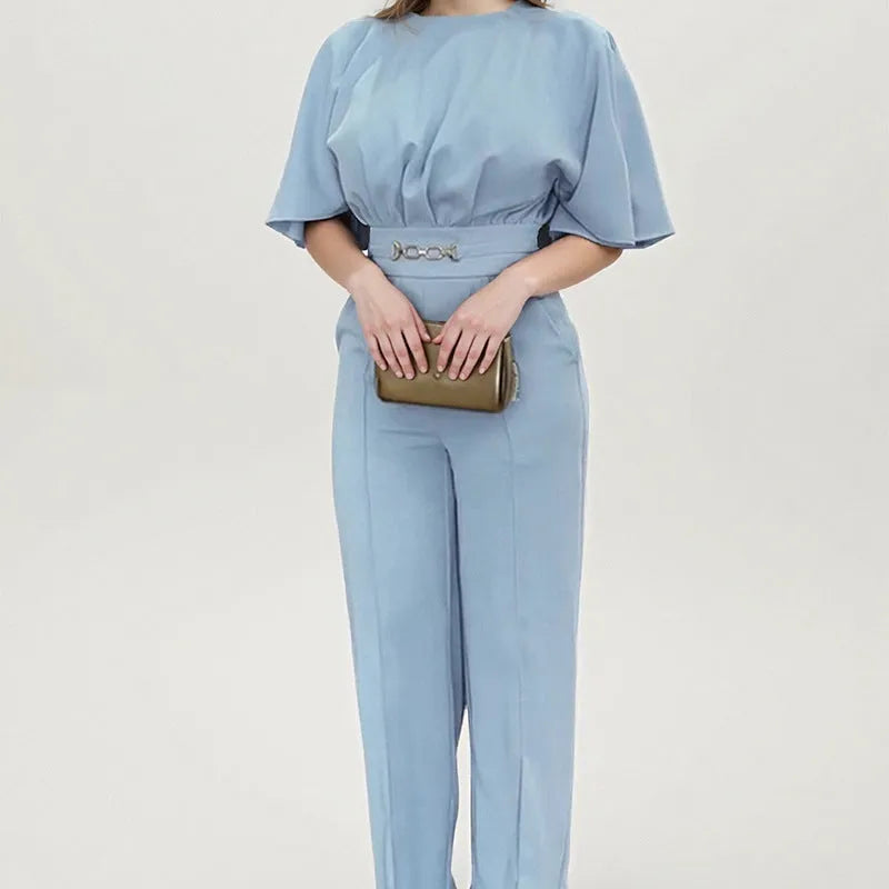 Blue polyester men's suit set with matching trousers and long-sleeve jacket on hanger