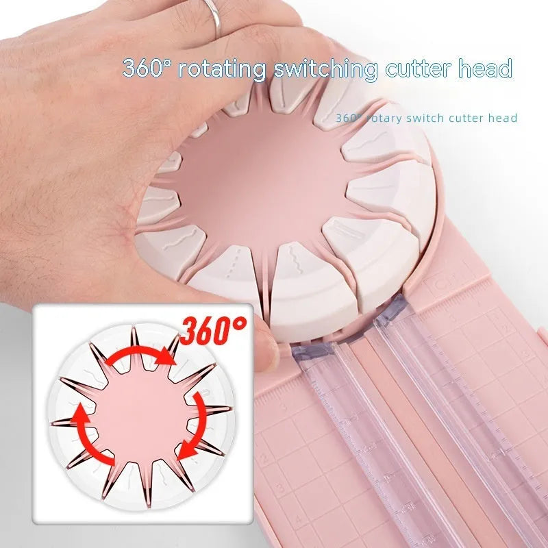 Plastic 12-in-1 paper cutter machine with dotted guide lines in pink colour on white background