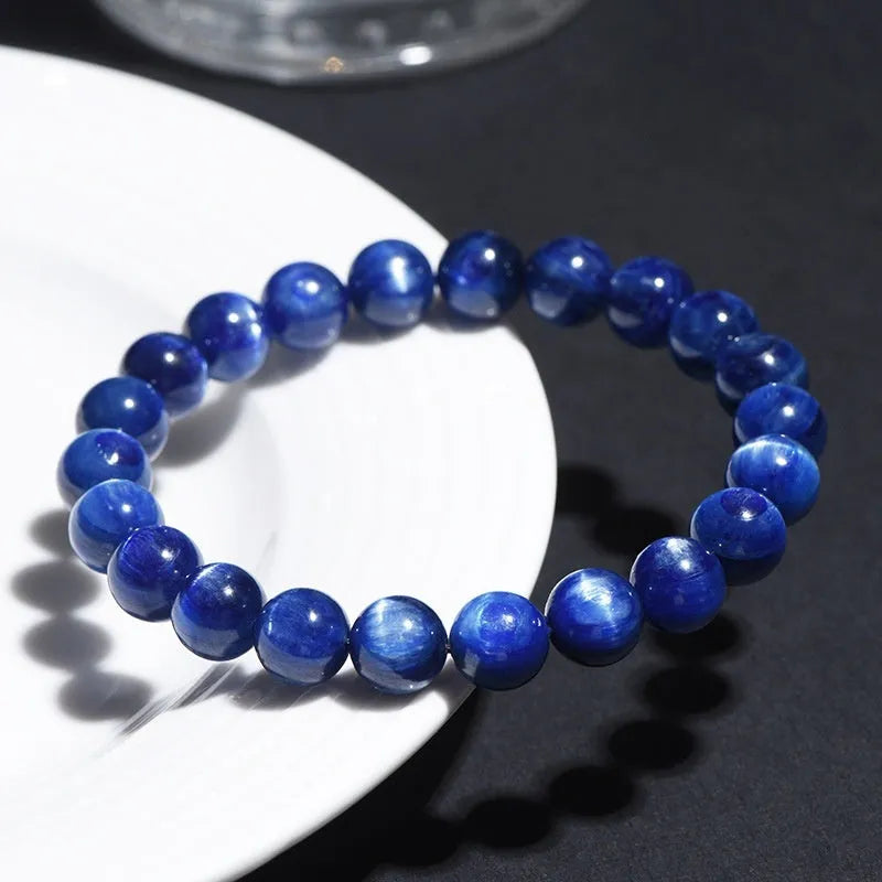 Natural blue crystal bracelet with Ruyi charm in polished 7A grade crystal for trade fair gifts.