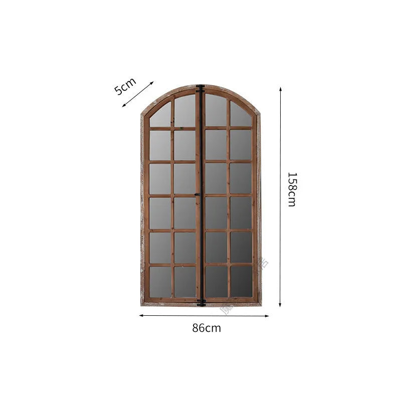 Terrace distressed wooden frame fake window wall mirror in log colour hanging on a wall.