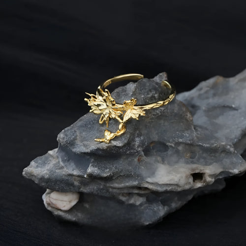 Adjustable silver butterfly ring for women in white gold or 18K gold electroplated finish.