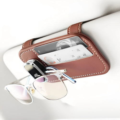 Leather car sun visor card holder with sunglasses clip in snap-on design available in multiple colours.