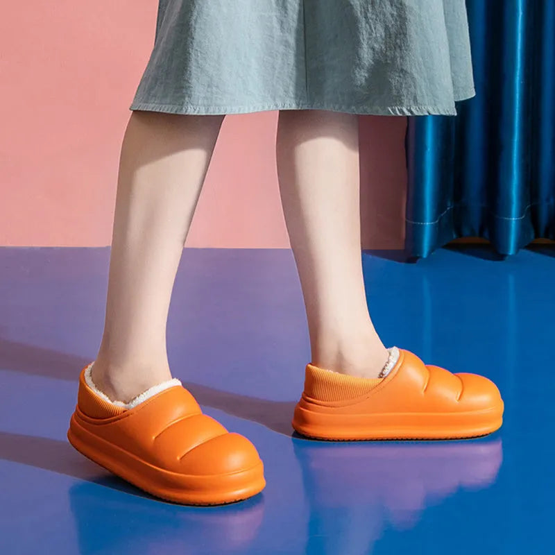 A pair of green EVA couple slippers with plush lining, shown as indoor house shoes and outdoor garden overshoes.