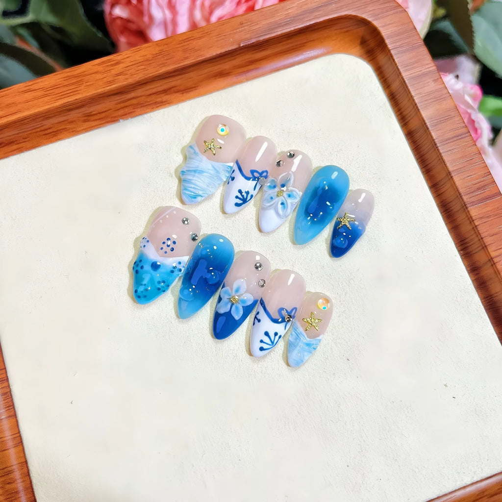 Blue hand-painted carved summer ice transparent plastic fake nails with floral design