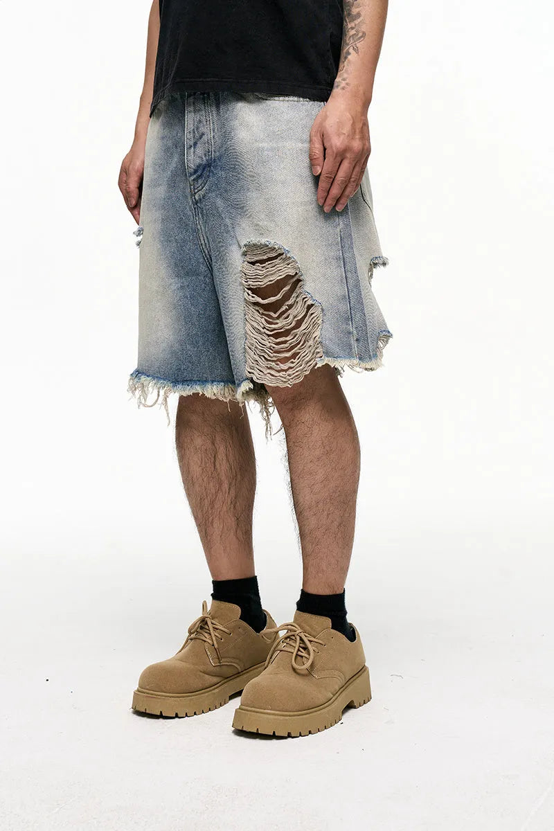 Light blue men's retro washed denim shorts with baggy wide leg fit