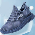 Men's beige mesh-lined casual sneakers with synthetic leather upper and white EVA sole.