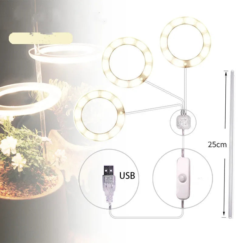 USB-powered LED plant grow light with full spectrum yellow LEDs, acrylic mounting stick, in pink/white colour.