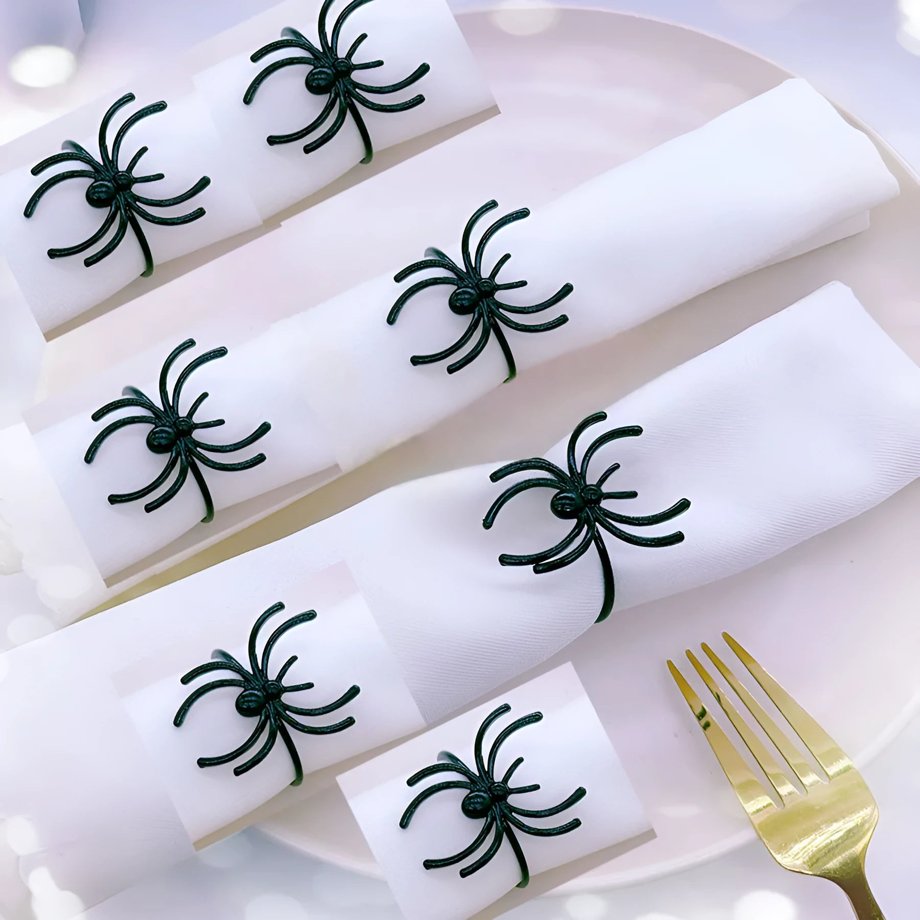 Six black alloy spider design napkin rings for Halloween table settings