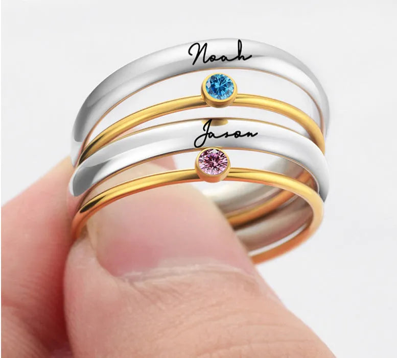 Titanium steel engraved ring with December birthstone and gold-plated steel lettering on geometric band