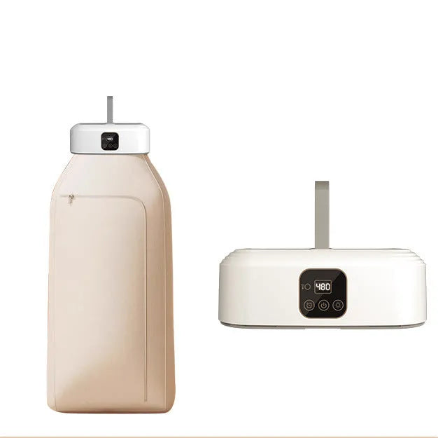 White cylindrical laundry dryer with remote control on surface showing compact 29cm length design