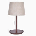 Walnut coloured solid wood desk lamp with a white fabric lampshade and a cable switch.