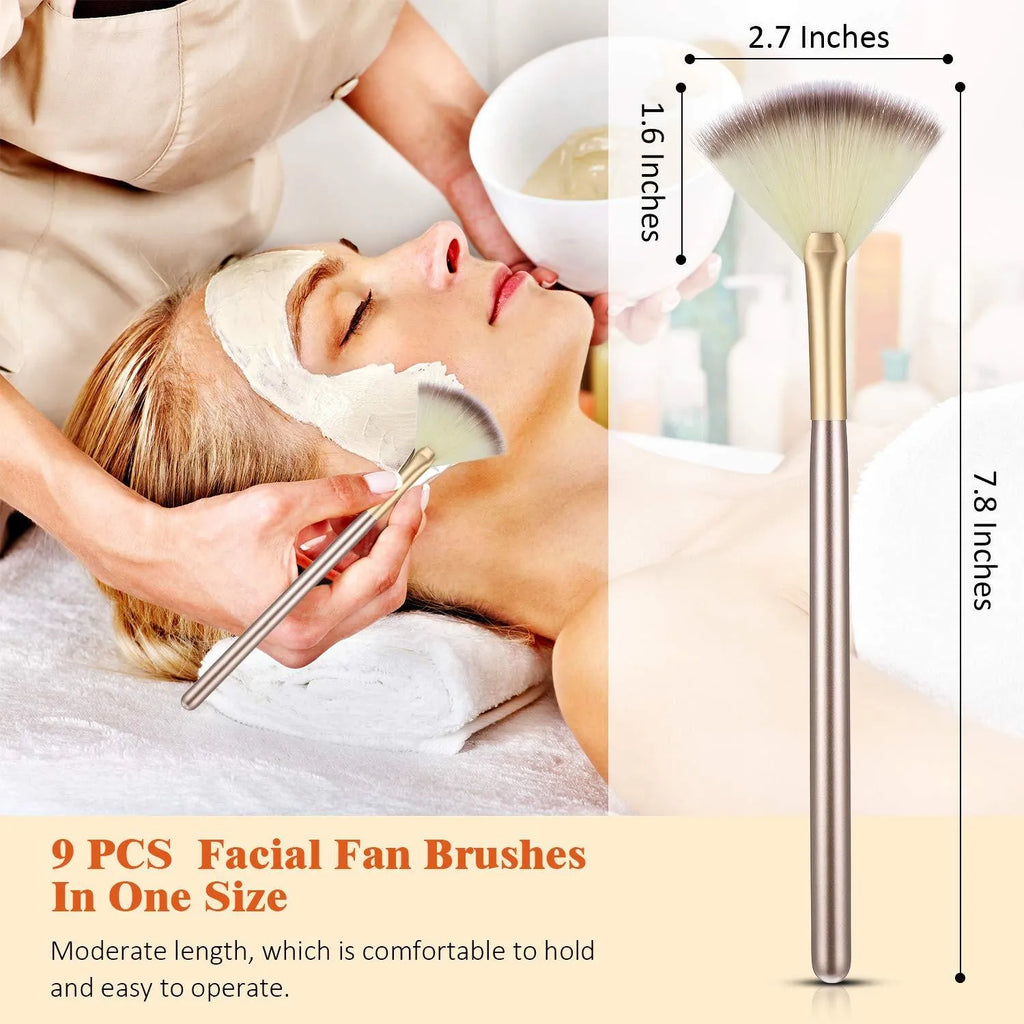 Set of 10 professional fan makeup brushes with champagne handles and protective covers.