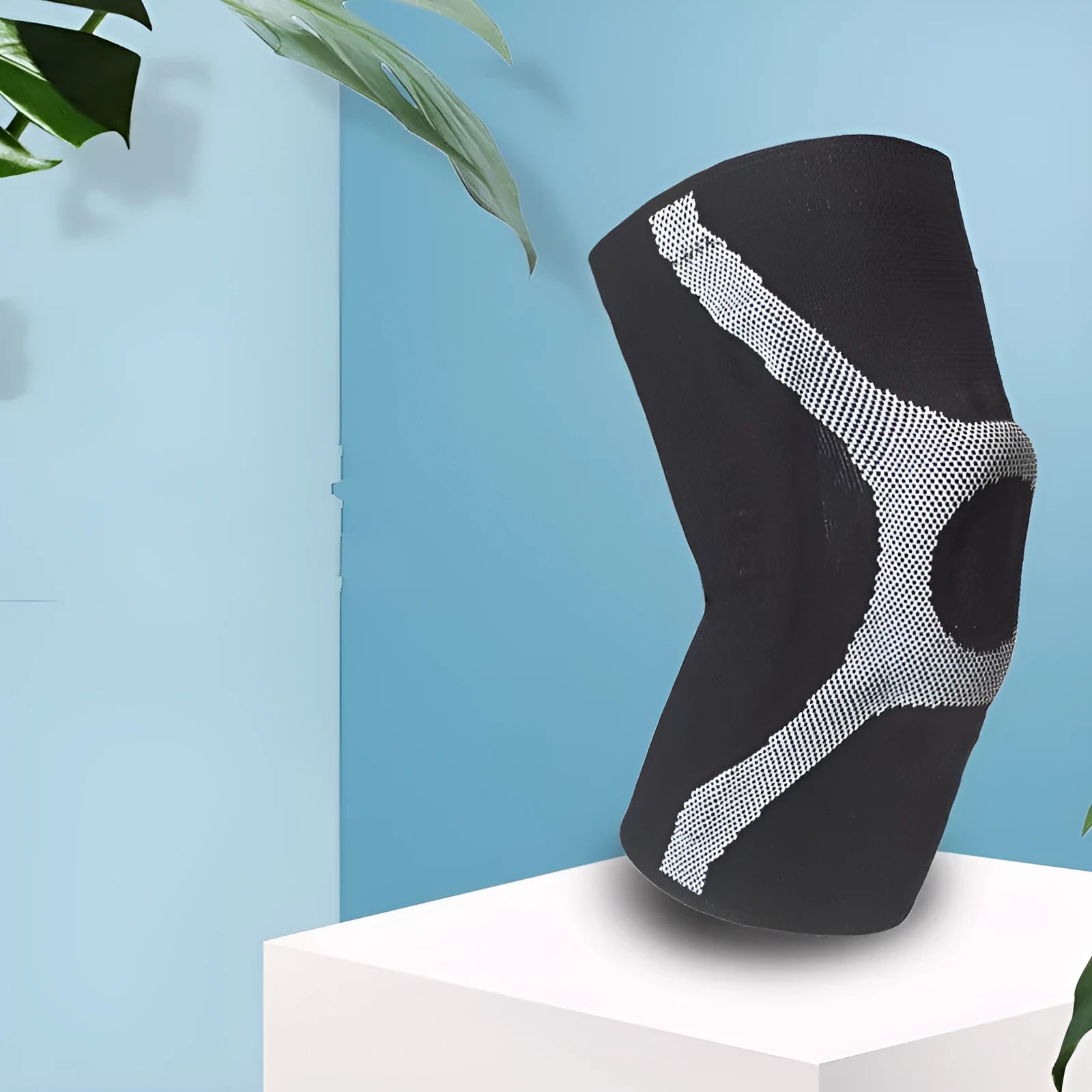 Red and grey knitted sports knee pads with non-slip silicone grip for running and climbing.