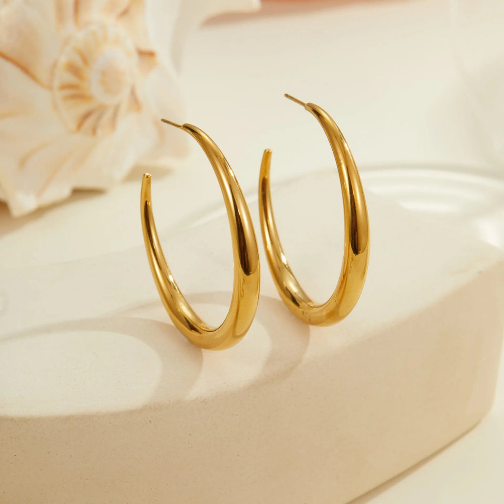 Titanium steel hoop earrings with 18K gold plating in small and large sizes