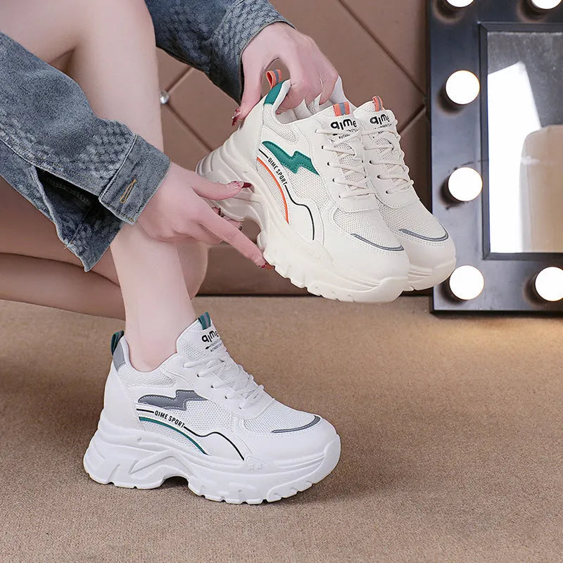 White women's dad shoes with cross shoulder straps, lace-up front, and a breathable mesh upper.