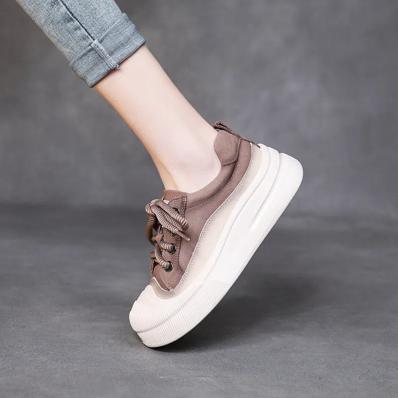 Women's yellow leather lace-up casual shoes with round toe and rubber sole.