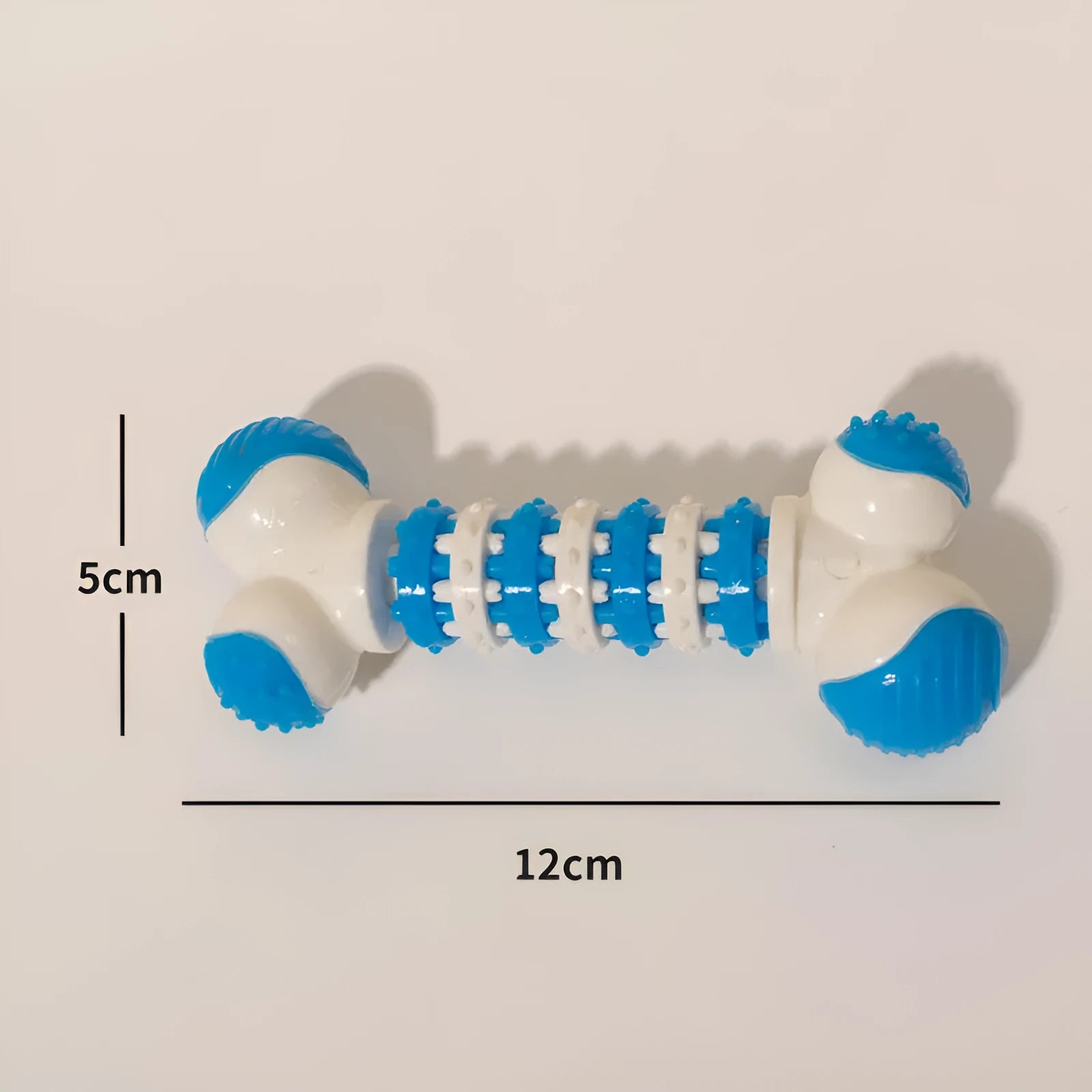 Blue bone shaped interactive dog chew toy with a treat holder in the centre for small breed dogs