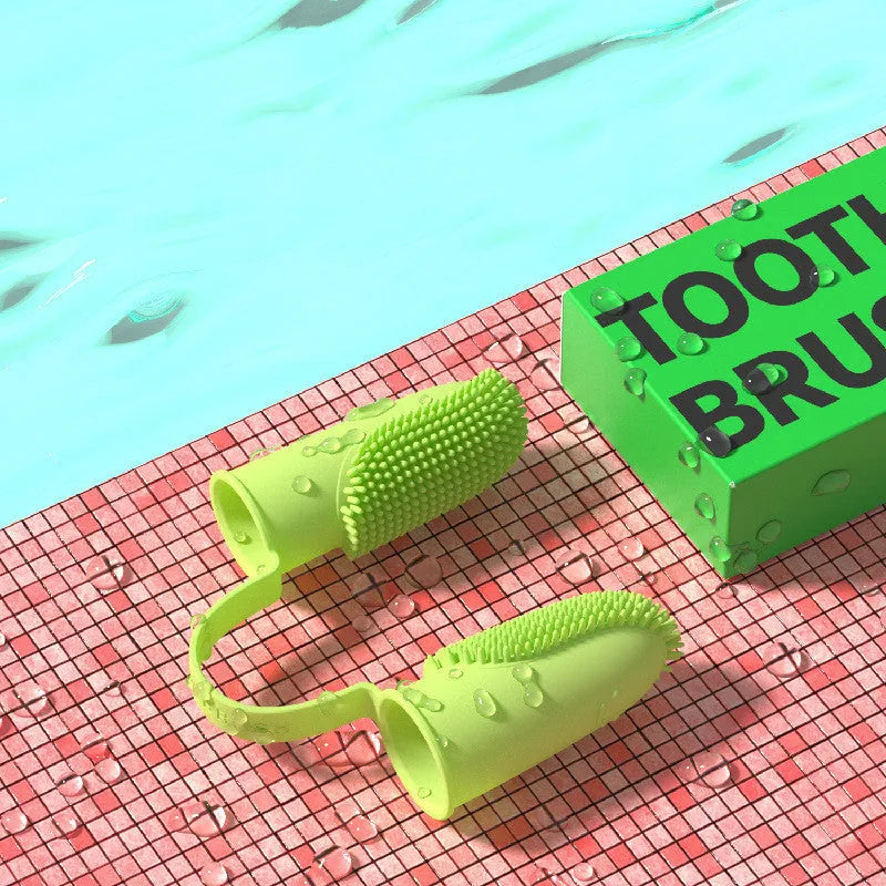 TPR silicone finger toothbrush for pet dental cleaning in blue green, pink, or yellow.